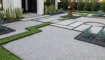 Modern pea gravel landscape with clean lines and architectural plants in Houston, TX